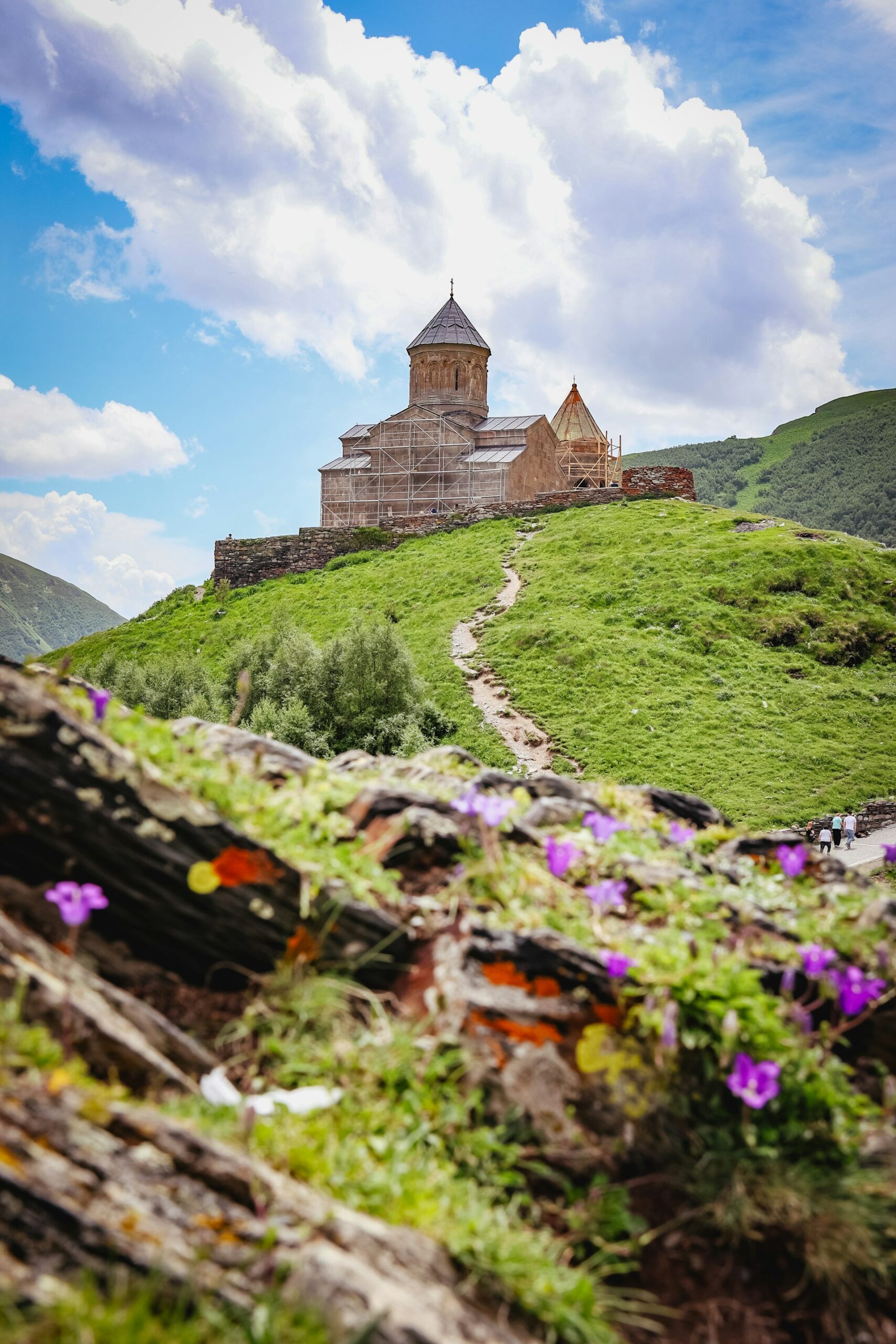 Gergeti Trinity Church, a medieval stone Orthodox church perched on a hilltop in the Caucasus mountains